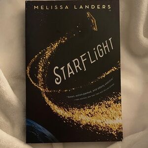 "Starflight" by Melissa Landers - paperback